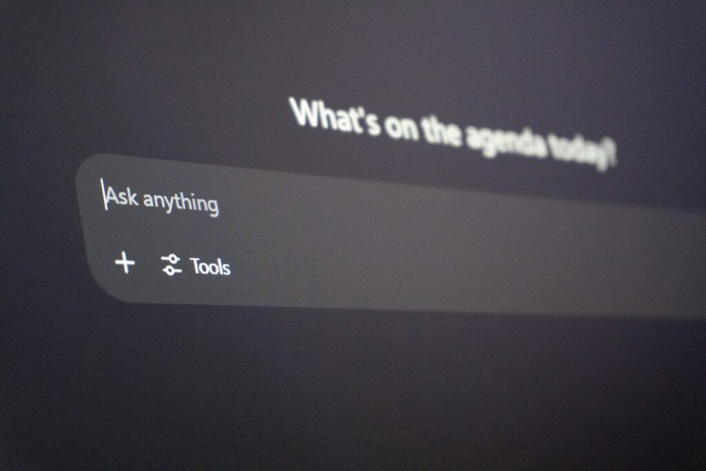 Digital interface with "ask anything" prompt.